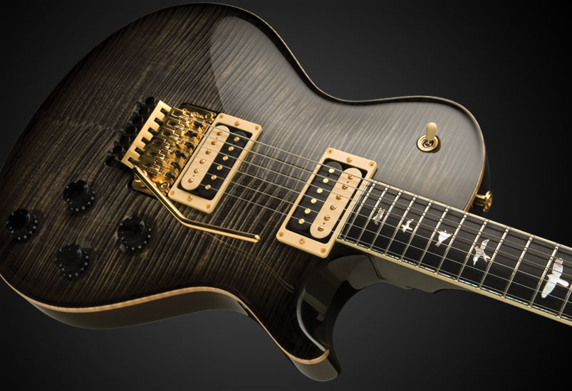a black Les Paul with gorgeous Maple flames and gold hardware