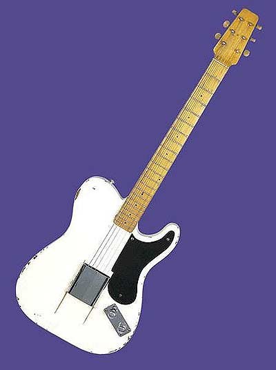 a beat up white Telecaster model guitar with black pick guard