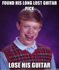 A nerd picture with funny caption, found long lost pick, loses his guitar