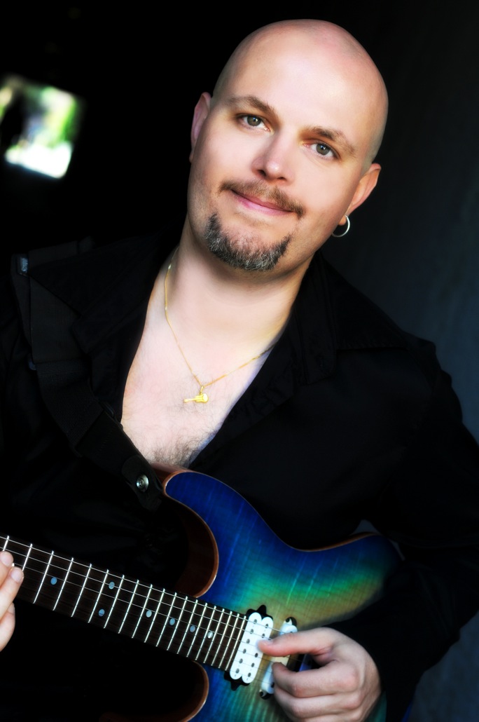 Headshot of Vreny Van Elslande - Guitar Teacher