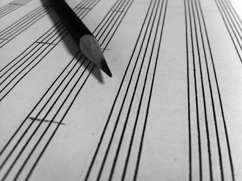 Music staff paper and pencil