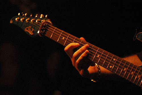 Close up of Vreny's guitar neck during a live show
