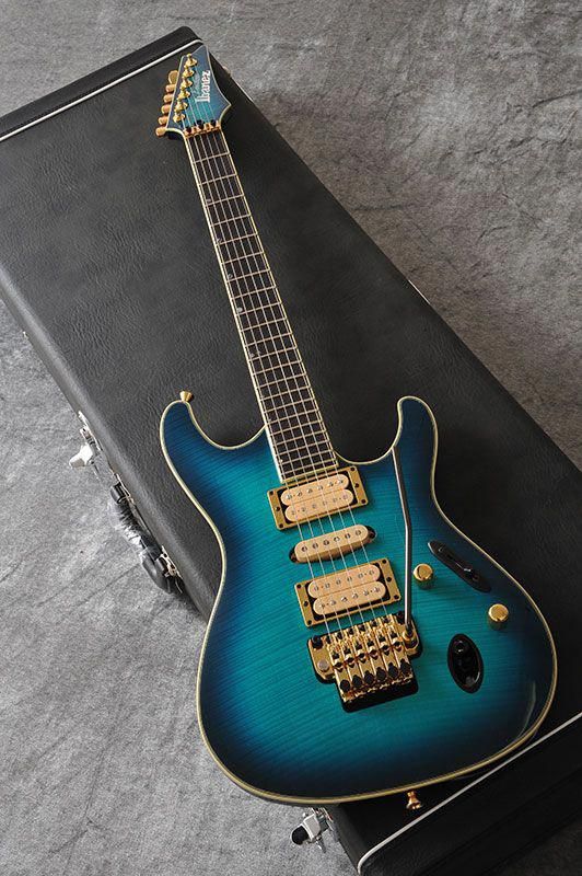 I LOVE this blue. I just never liked the rectangular things around humbuckers without pick up covers. 