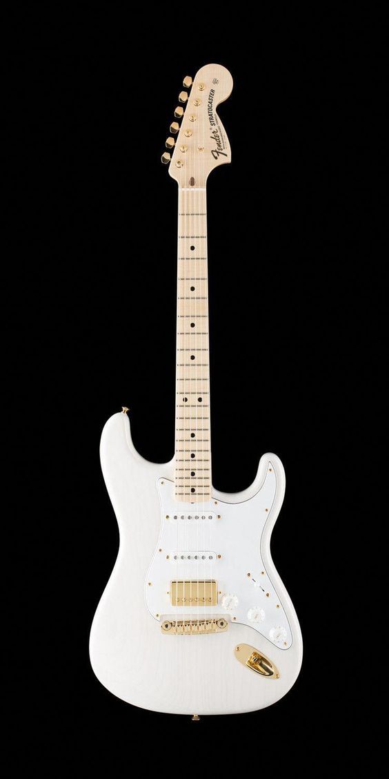 An off-white Fender Strat with light colored maple neck, SSH pick up configuration, gold bridge, humbucker cover and input jack plate