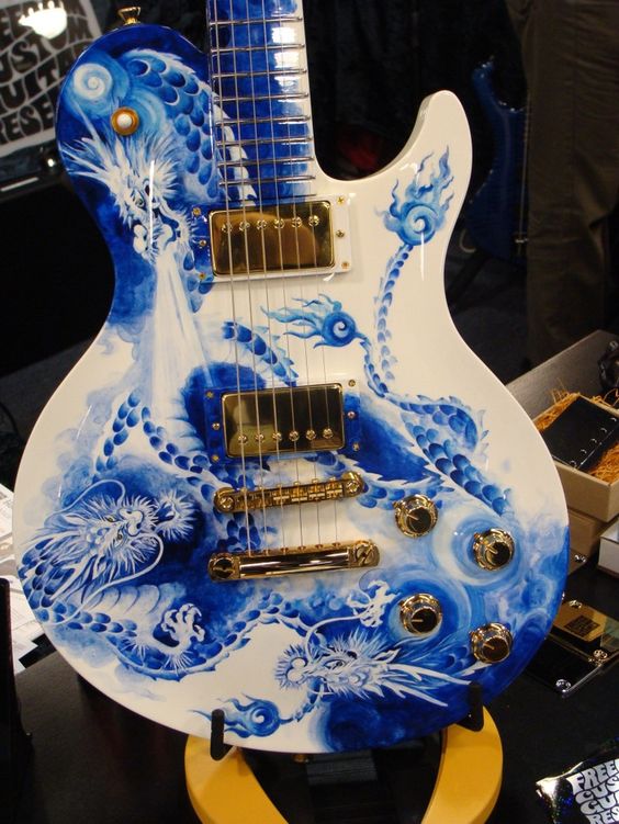 Delft Porcelain Guitar. The guitar looks like it was made in Delft, Holland. 
