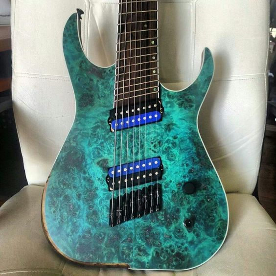 Skervesen Guitars 8-string guitar, Turquoise  burl guitar with very bold shiny, dark blue pick ups