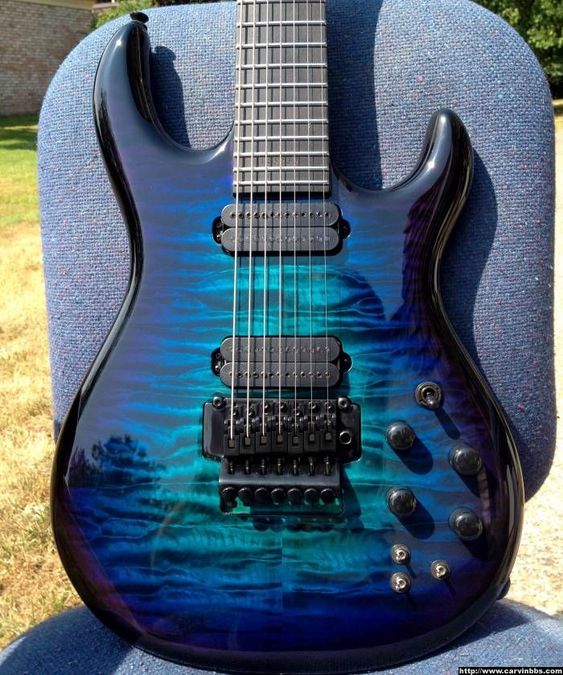 Quilted maple flames, purple to blue to turquoise burst. 