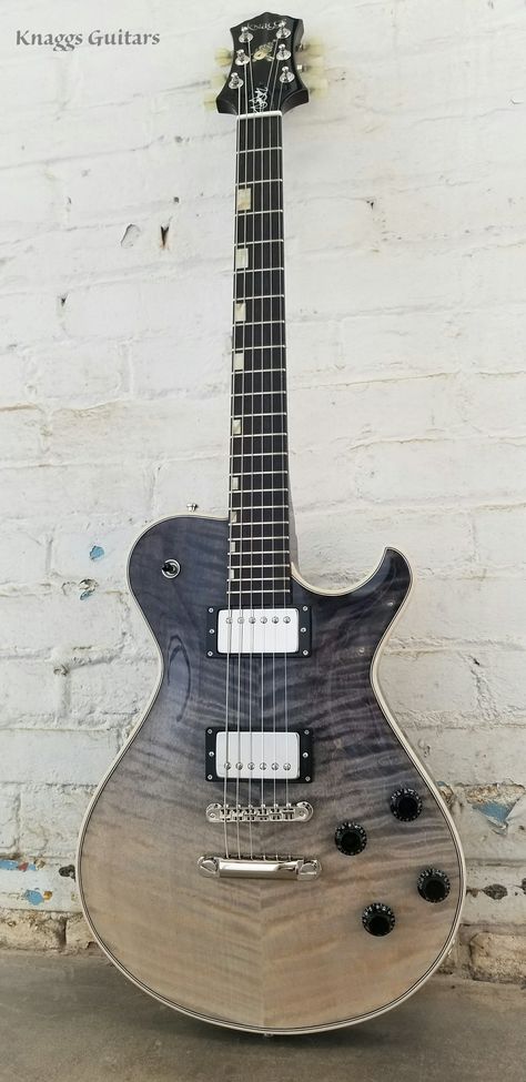 This Ash Grey Knaggs Guitar is influenced by the Les Paul design with sharper contours