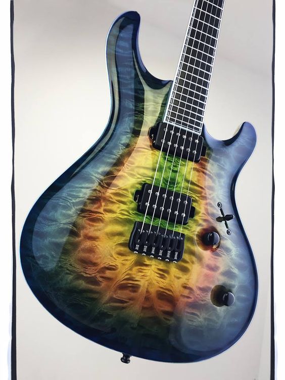 Colorful multic-color burst guitar with all-black hardware, knobs and pick ups