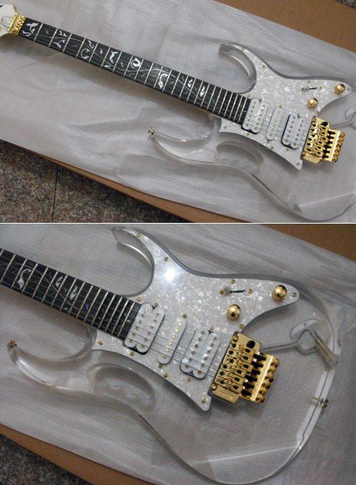 A transparent see-through Steve Vai Ibanez with gold hardware 