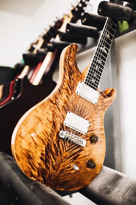 Fiery Burl wood lines, chrome hardware and pick up covers, big brown knobs