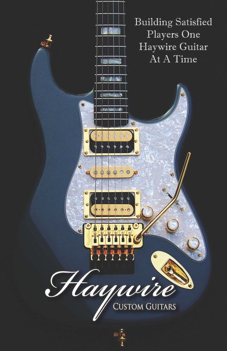 A classy looking Strat combining dark blue finish with yellow gold hardware and white pearl knobs and pickguard