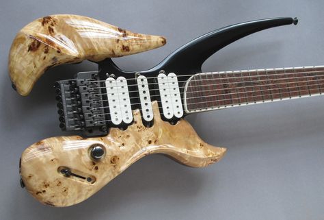 Gorgeous wood, 7-string, white HSH pick up configuration. 