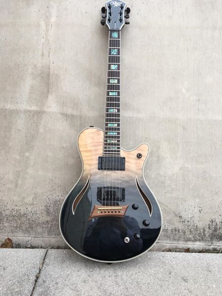 black hollow body acoustic electric guitar