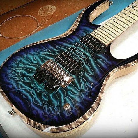7-string with amazing paint job on a quilted maple top