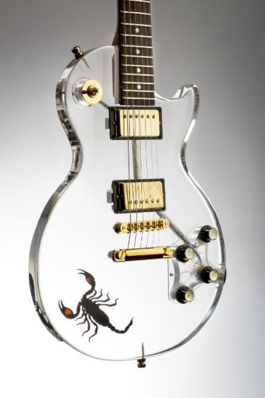 Plexi glass Les Paul with gold harware and black scorpion embedded inside the glass guitar body