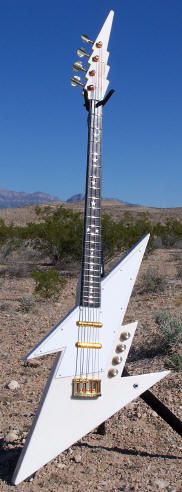 A custom White Thunderbolt shaped guitar