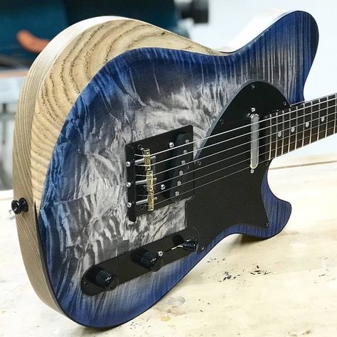 Gorgeous transparent blue, white grey'ish guitar body