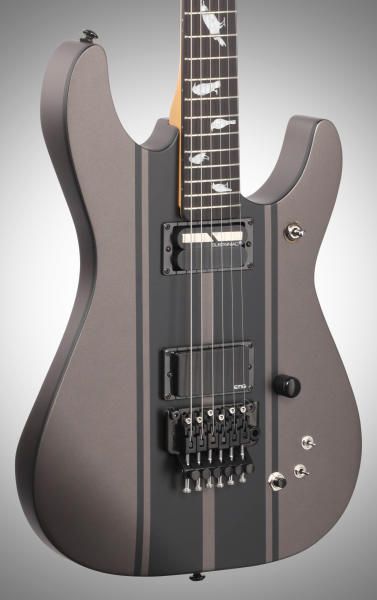 Grey Strat style guitar with darker grey sportsy stripes, and black bridge, black humbuckers and knob