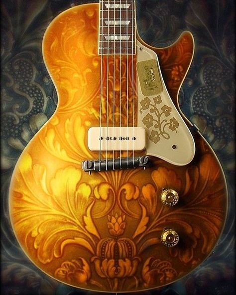 Sunny floral pattern Les Paul with one white pick up, a chorme bridge and 2 golden colored knobs. 